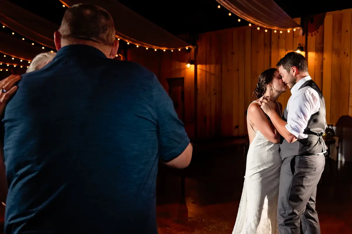 First dance in the low, warm light of the Sowell Farms reception