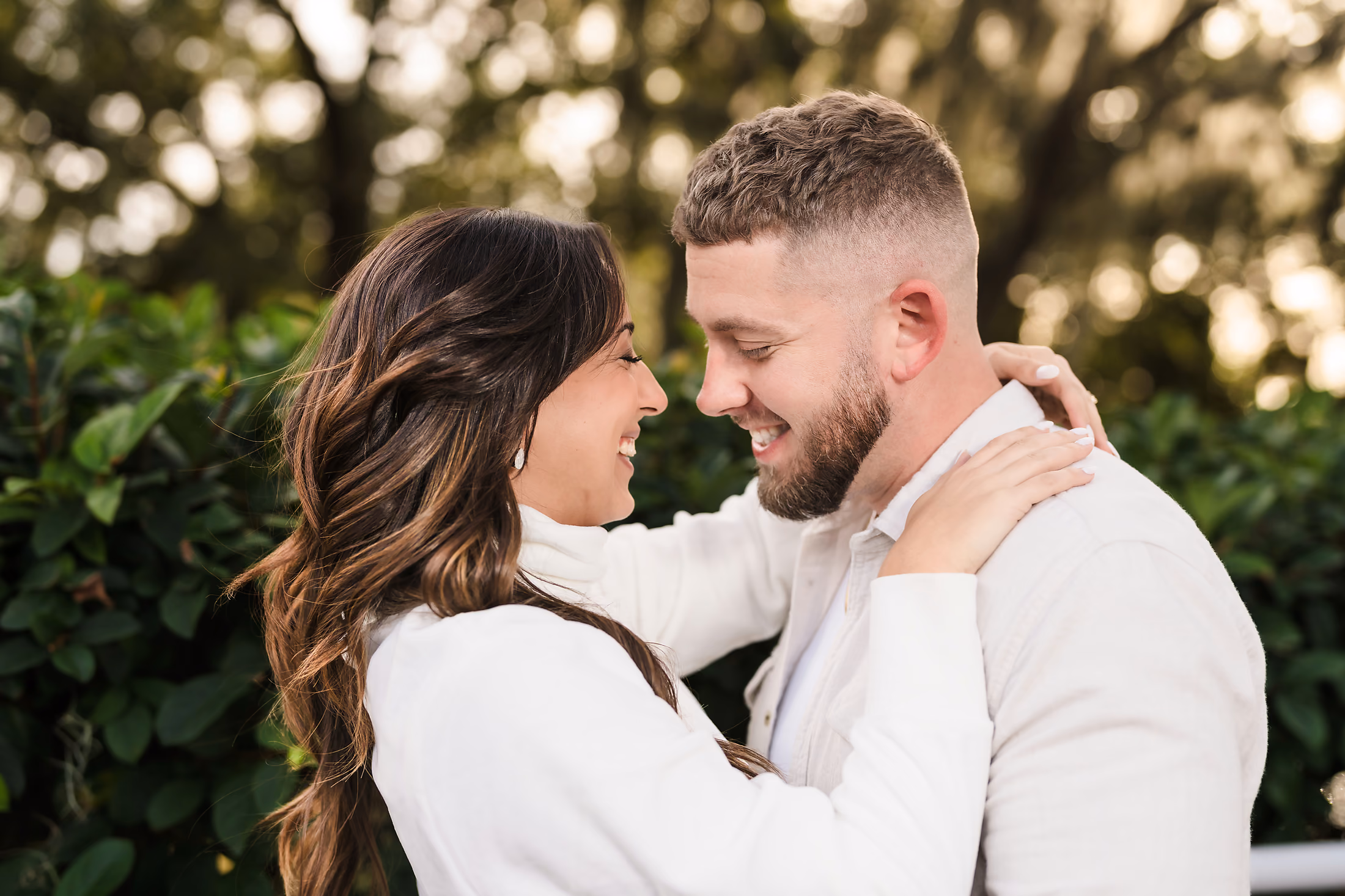 Couple holding close during an engagement session