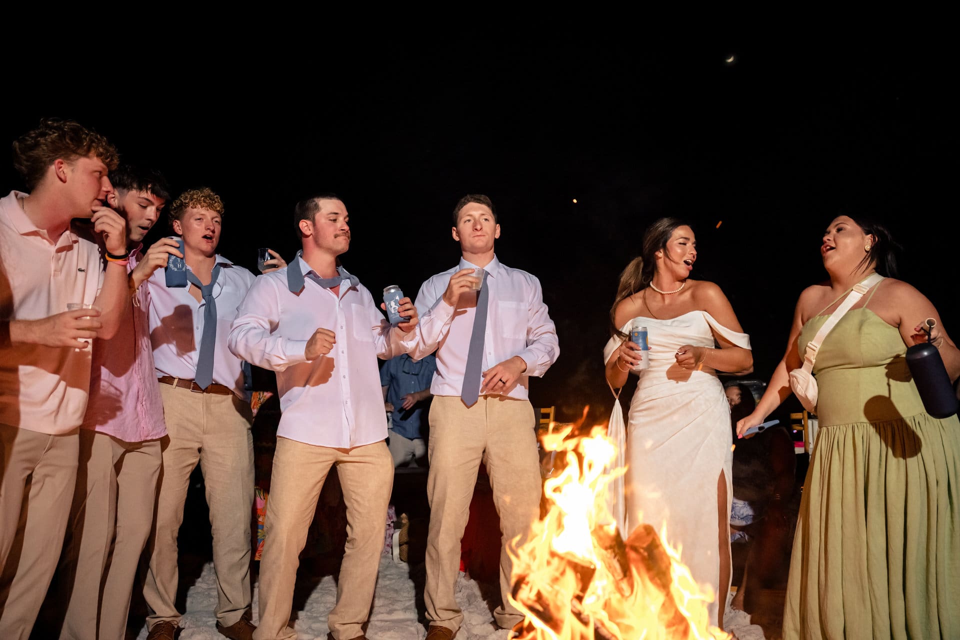 Candid wedding reception moment at Santa Rosa Beach captured by 8nfinity Photography
