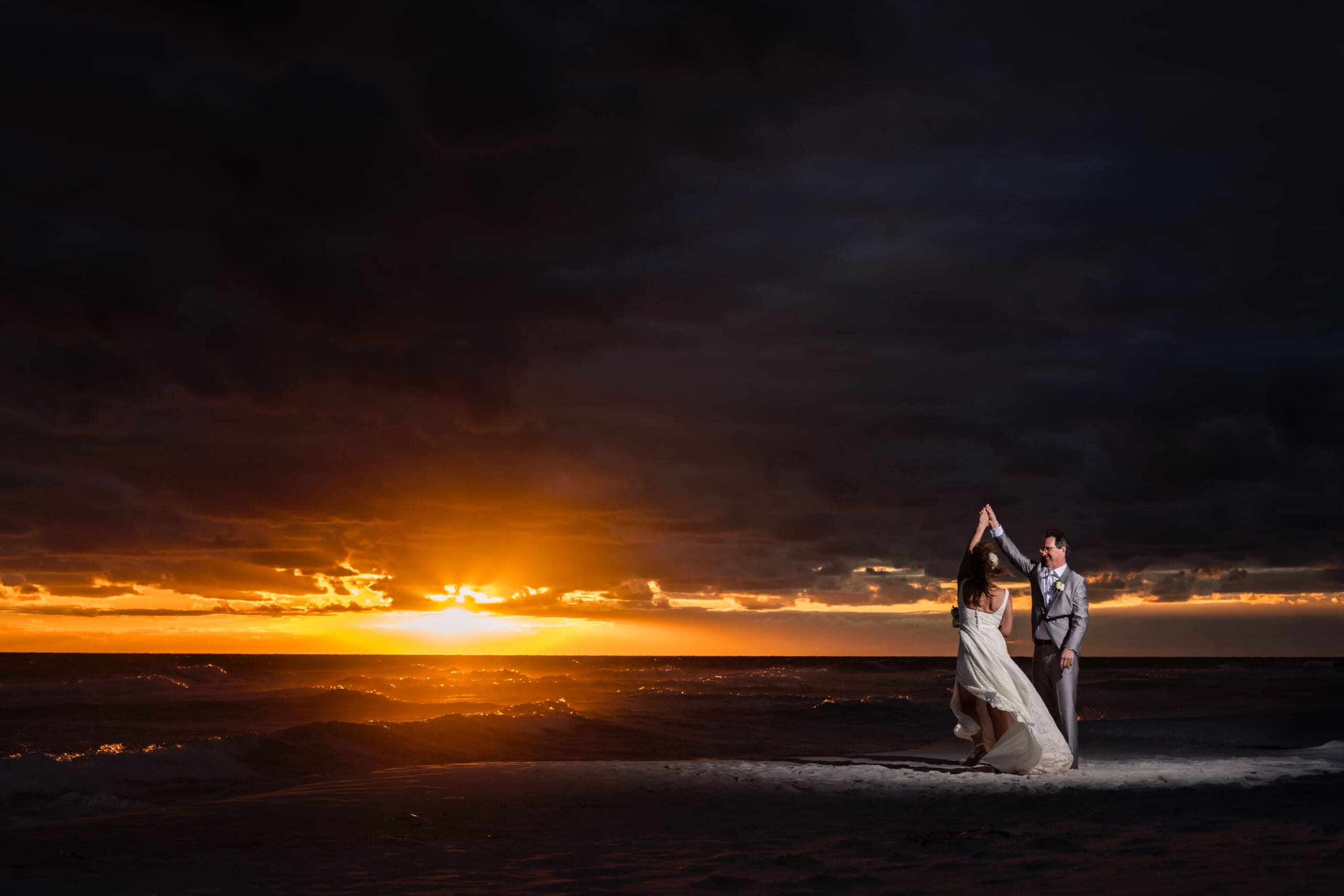 Newlyweds sharing first dance at Pensacola wedding reception