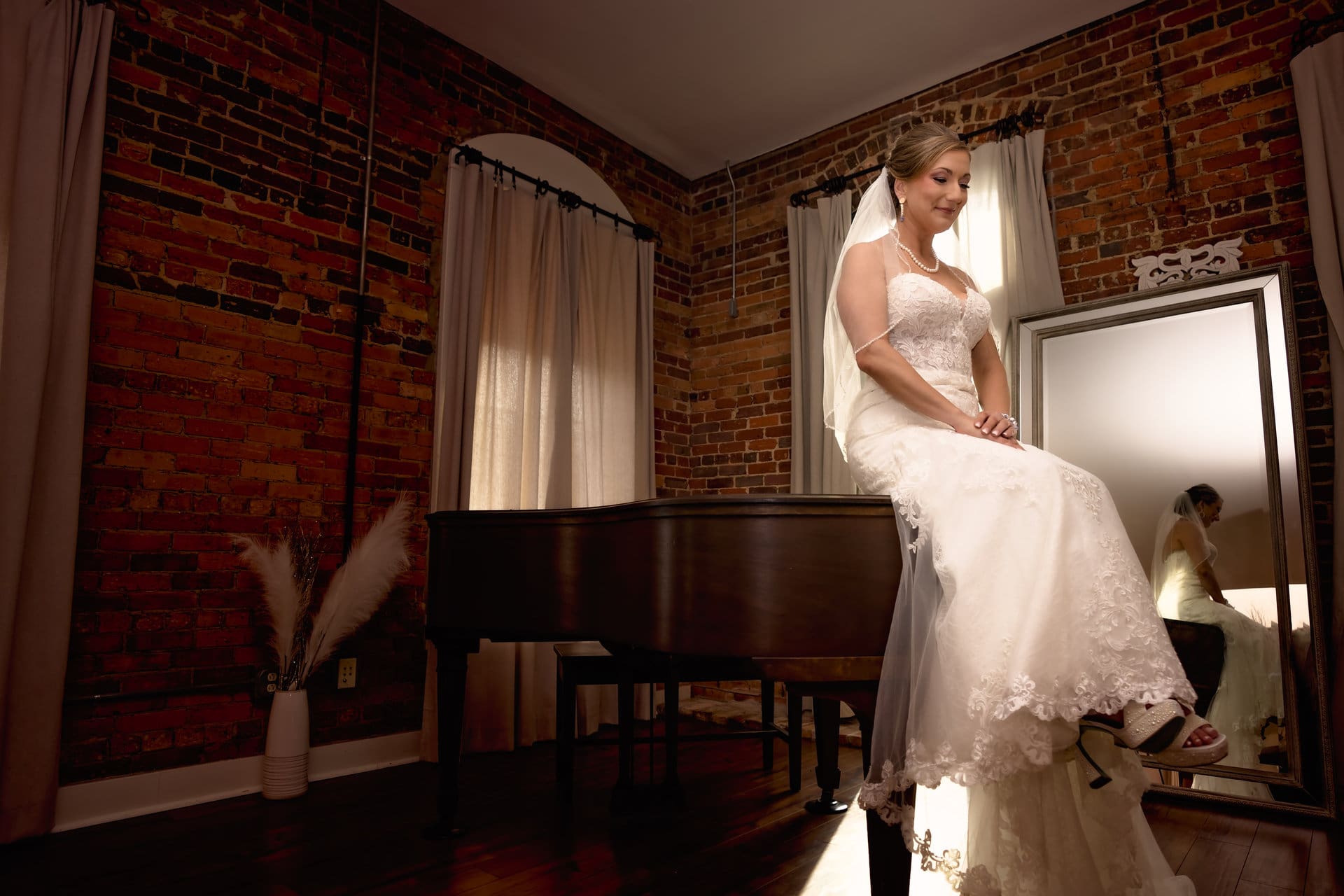 Adam, Laura and their children blended family portrait at their wedding at Odd Colony Brewing, Mobile, Alabama