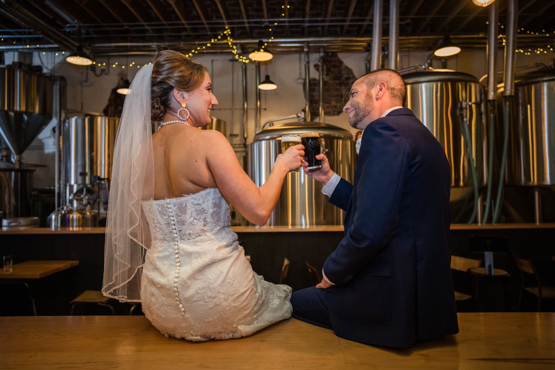 Adam and Laura wedding portraits at Odd Colony Brewing craft brewery in Mobile, Alabama