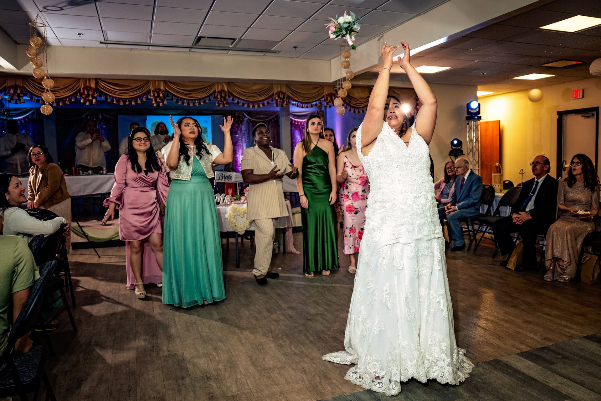Joyce bouquet toss at her Filipino-American wedding reception in Pensacola, Florida