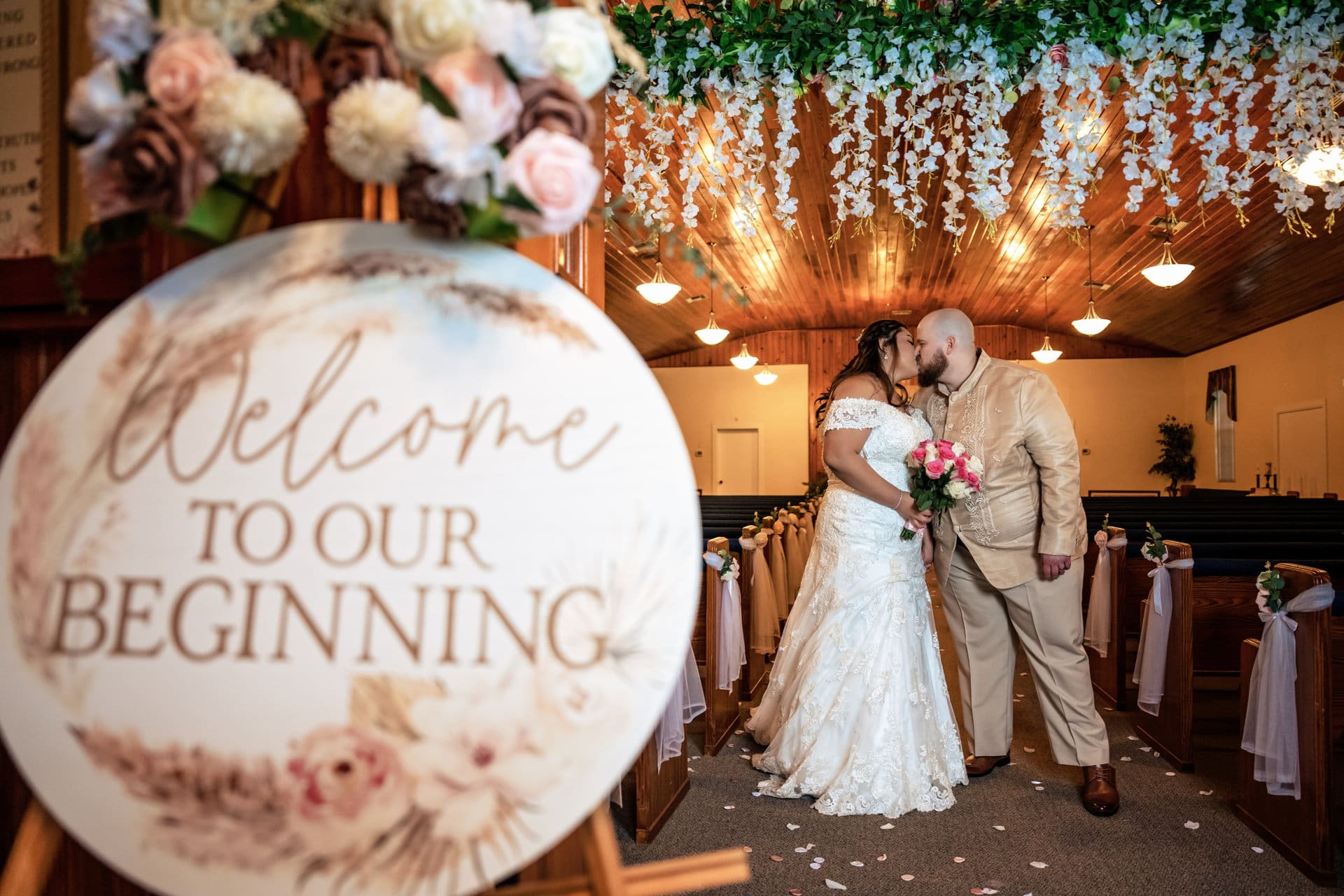 Joyce walking down the aisle at their Filipino-American wedding ceremony in Pensacola, Florida