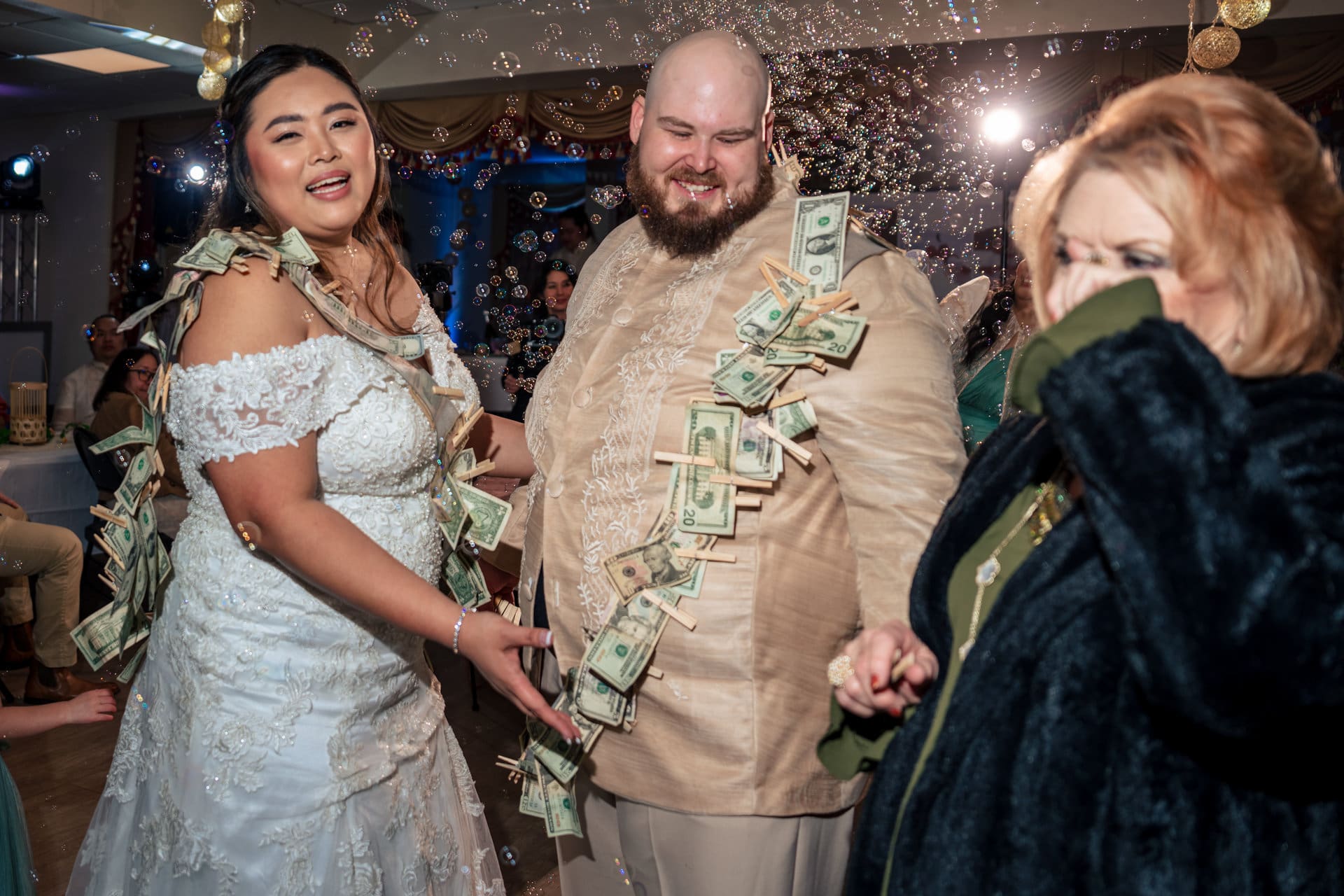 Traditional Filipino money dance at Joyce and Kyle wedding reception in Pensacola, Florida