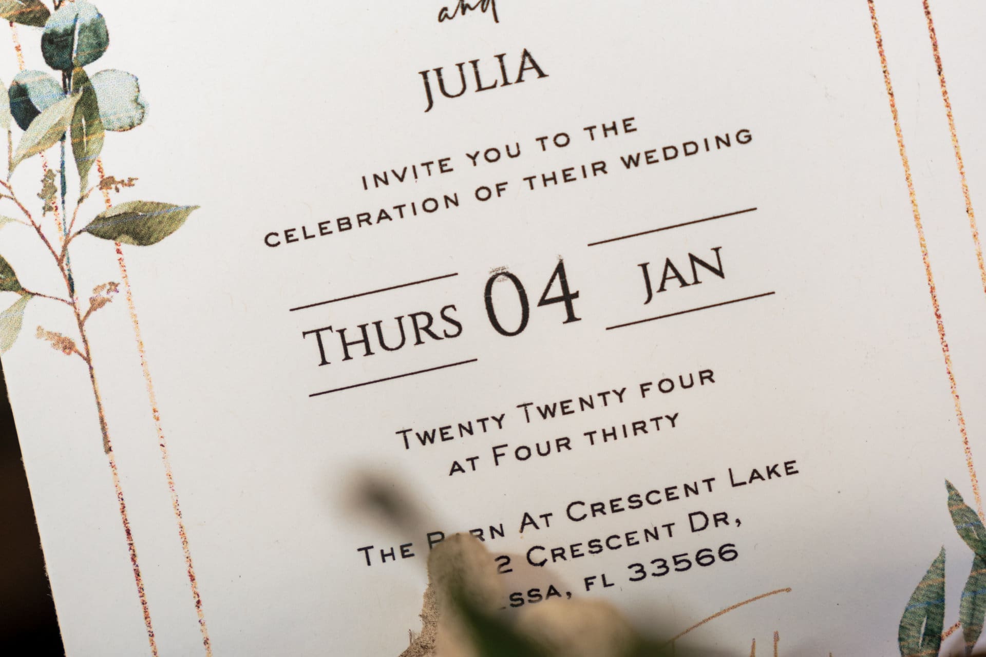 Wedding ceremony intimate first touch moment at The Barn at Crescent Lakes in Destin, Florida