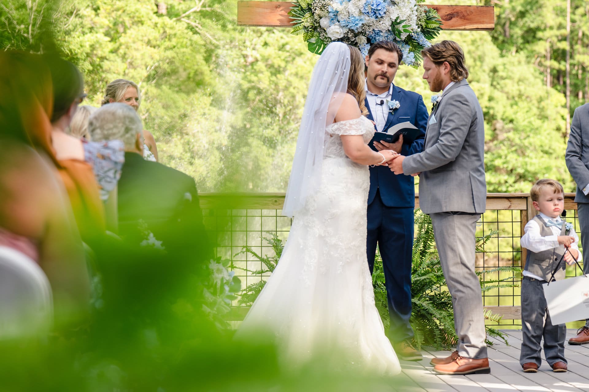 Outdoor golden hour ceremony at Hamilton's Pond wedding in McDavid Florida