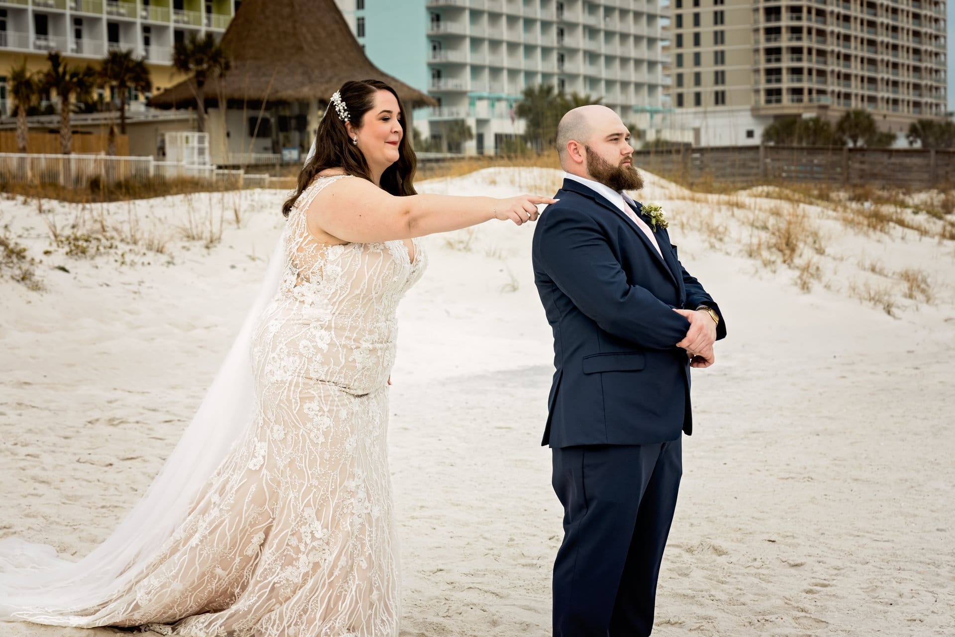 Emotional first look moment at Pier Suites Pensacola Beach wedding